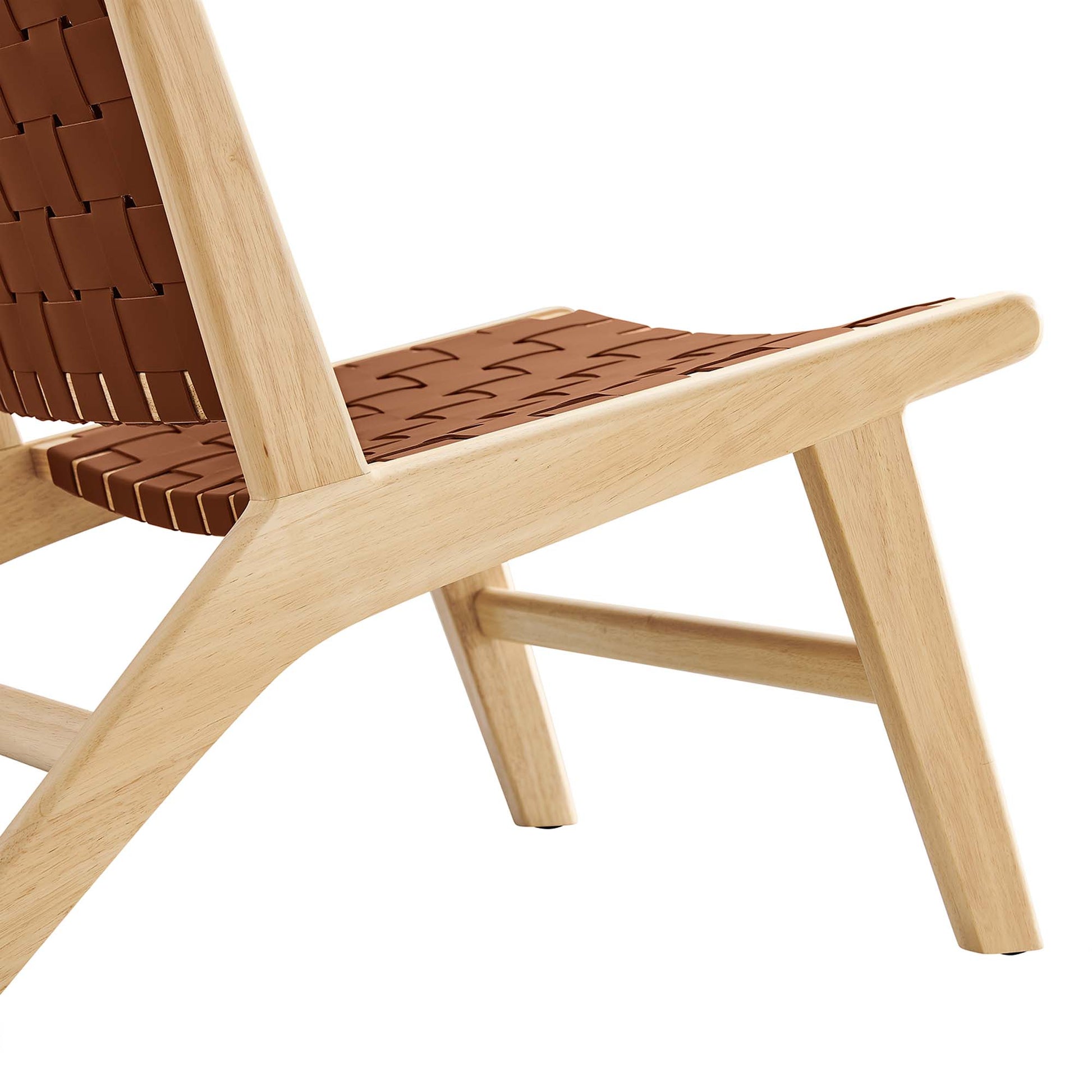 Natural wood lounge chair with brown leather seat and back and a mid-century angular frame.
