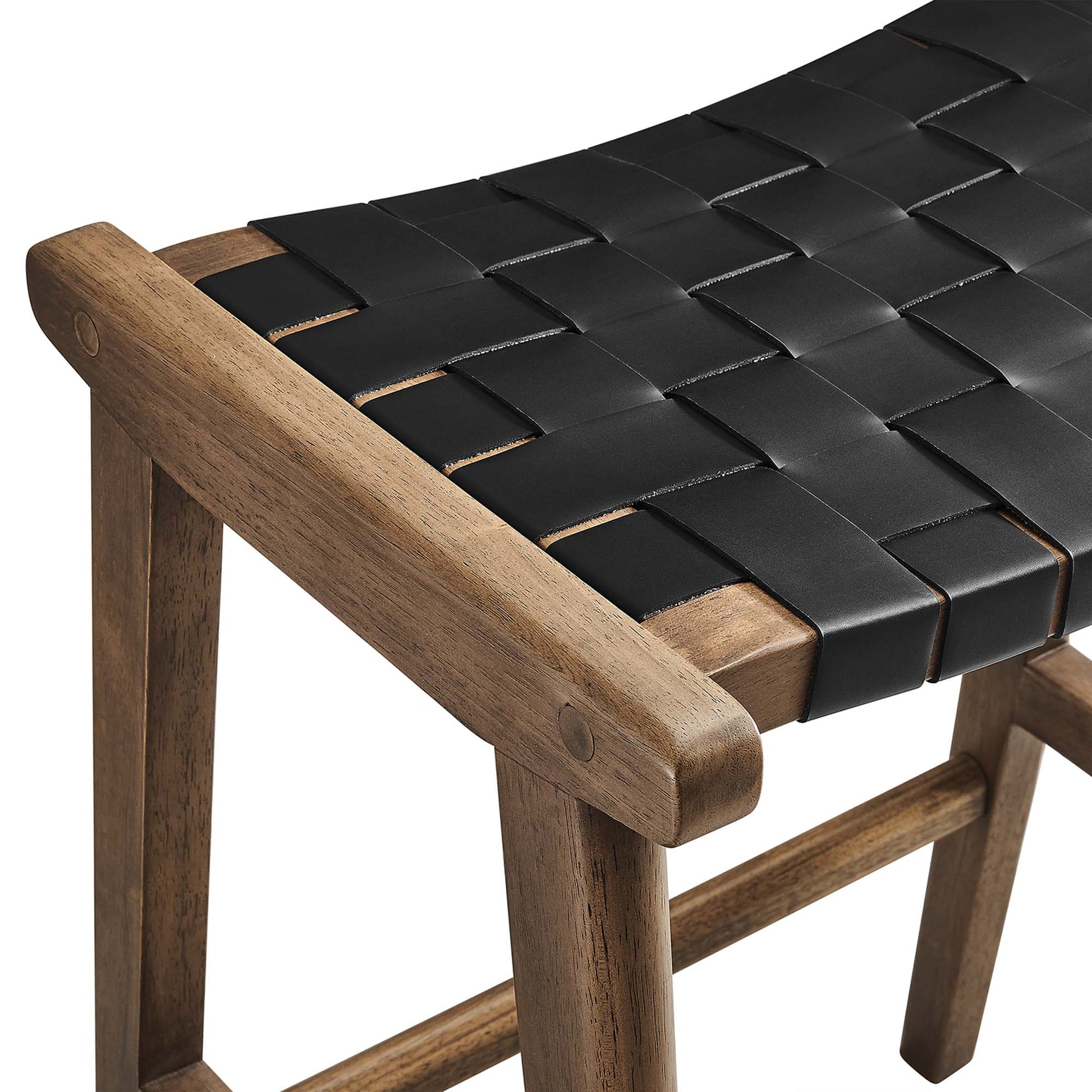 Walnut wood counter stool with a black woven faux leather strap seat in a basket-weave pattern.