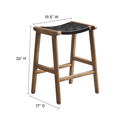 Walnut wood counter stool with a black faux leather seat, 26in tall, 19.5in wide, 17in deep, with footrest crossbars.