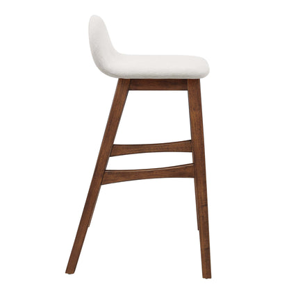 Mid-century bar stool with dark wood legs, curved white upholstered seat and backrest, and footrest.