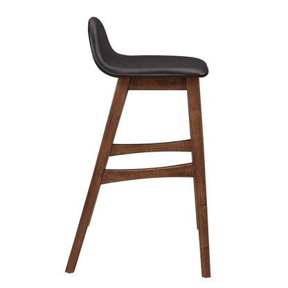 Set of 2 mid-century wooden bar stools with brown leather upholstered seats, curved backs, and angled legs with footrests.