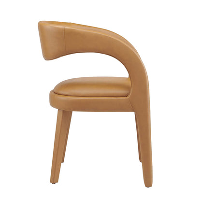 Tan vegan leather dining chair with a curved back forming an integrated armrest, cushioned seat, and four tapered legs (set of 2).