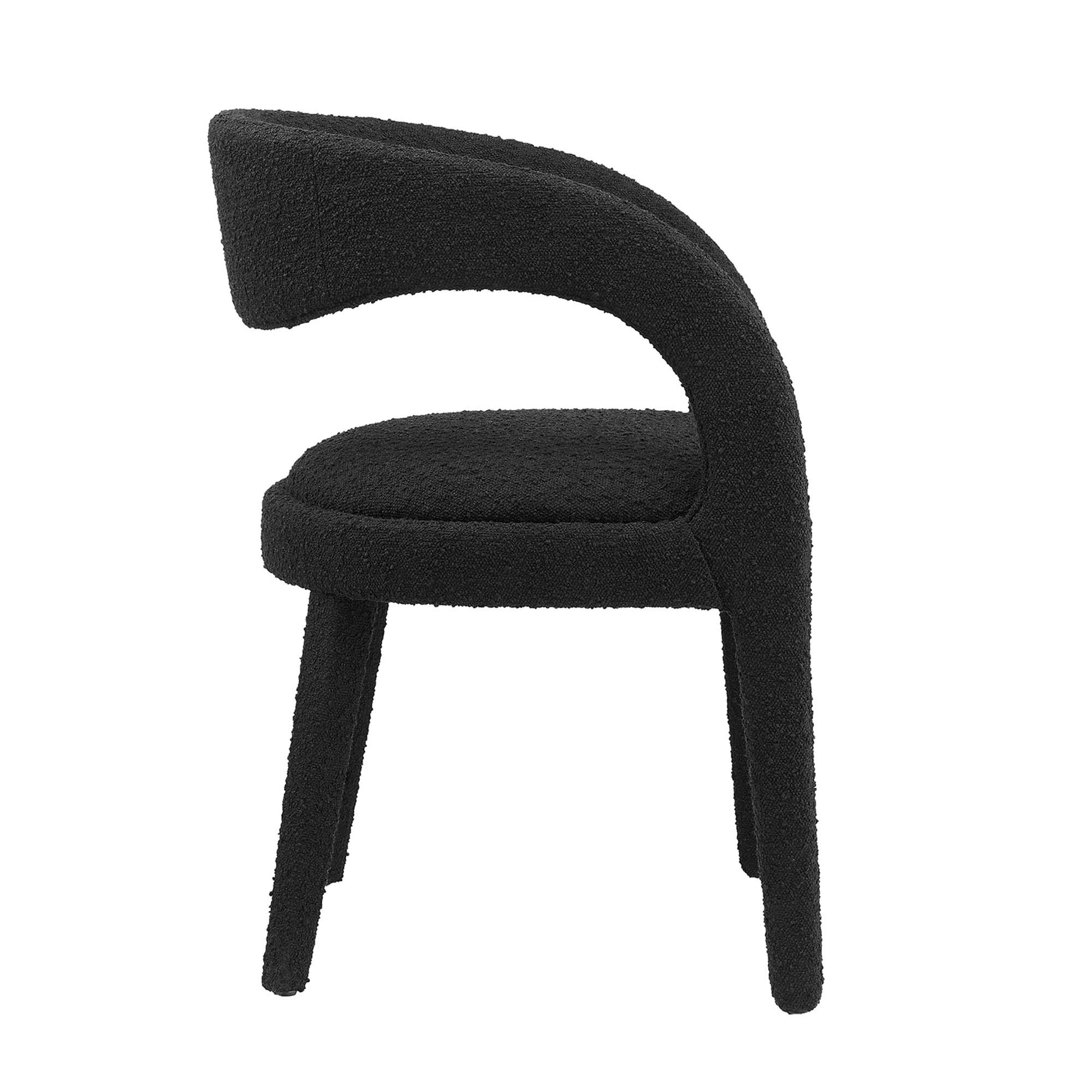Black boucle upholstered dining chair with curved wraparound back and four tapered legs (set of 2).