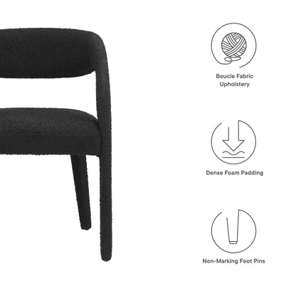 Black boucle fabric upholstered dining chair with curved arms, dense foam padding, non-marking foot pins.