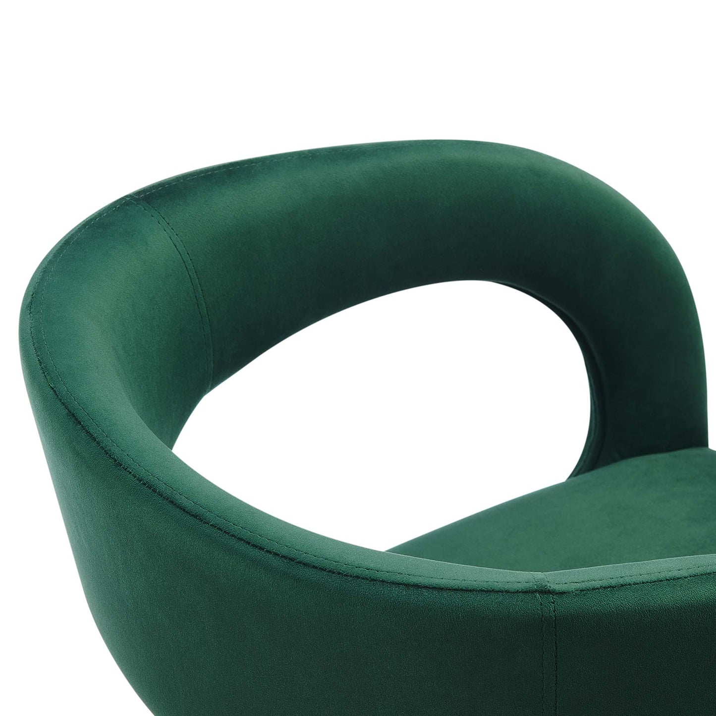 Emerald green velvet dining chair with a curved loop back and rounded arms; modern dining seating.