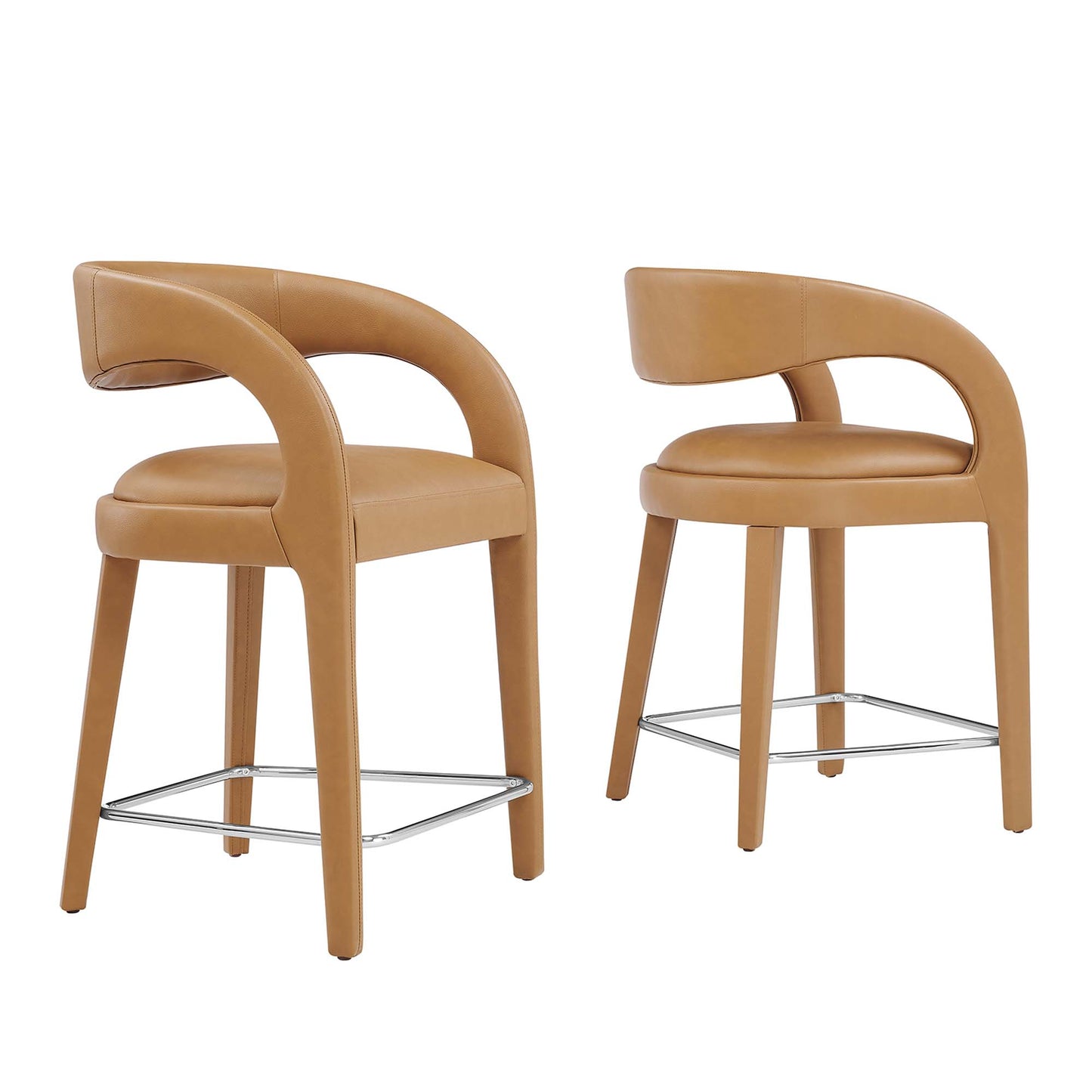 Tan vegan leather counter stools (set of 2) with curved wraparound arms, padded seats, wooden legs and chrome footrest.