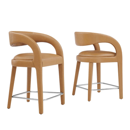 Tan vegan leather counter stools (set of 2) with curved wraparound arms, padded seats, wooden legs and chrome footrest.