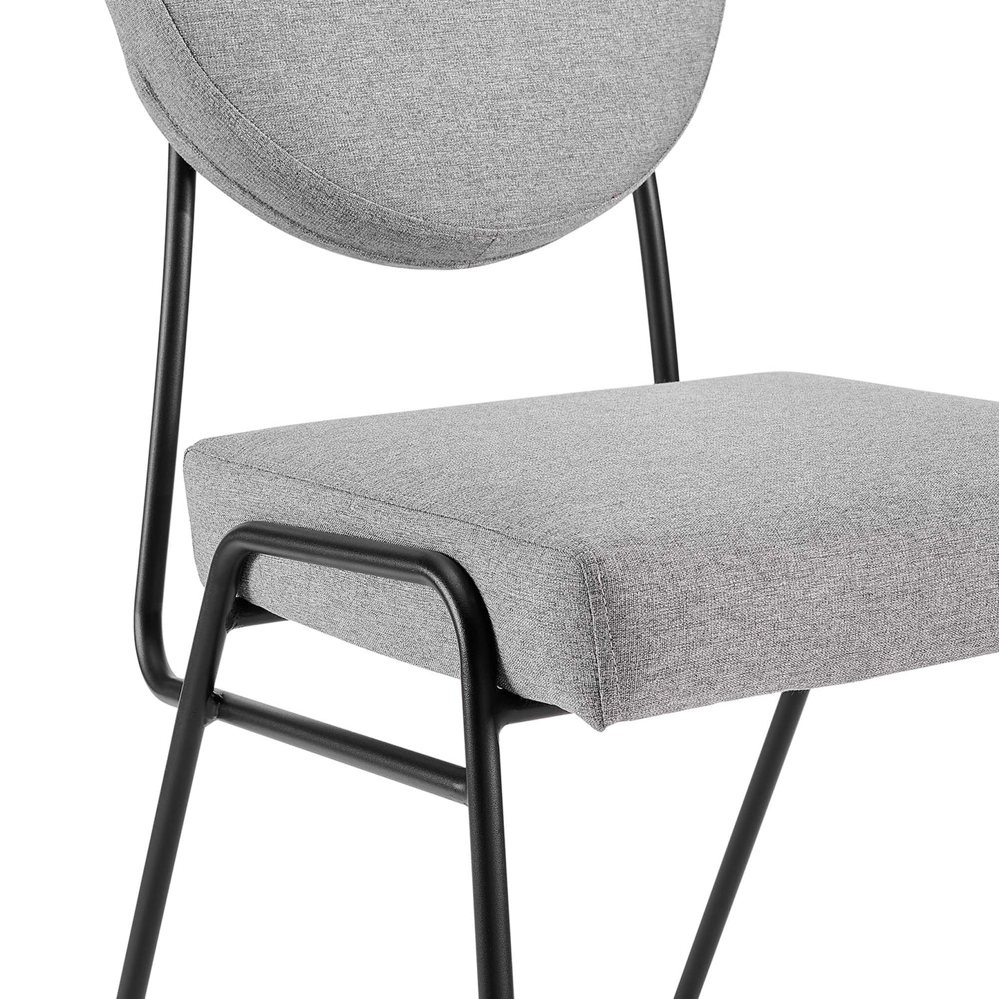 Gray fabric dining chair with circular backrest, rectangular cushioned seat, and black metal frame.