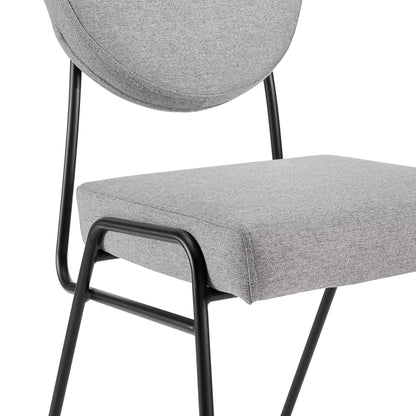 Gray fabric dining chair with circular backrest, rectangular cushioned seat, and black metal frame.