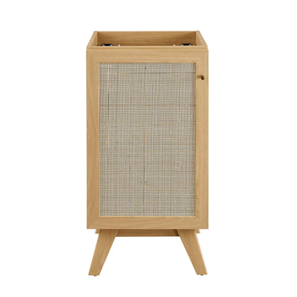 Oak wood bathroom vanity cabinet with doors; sink basin not included.