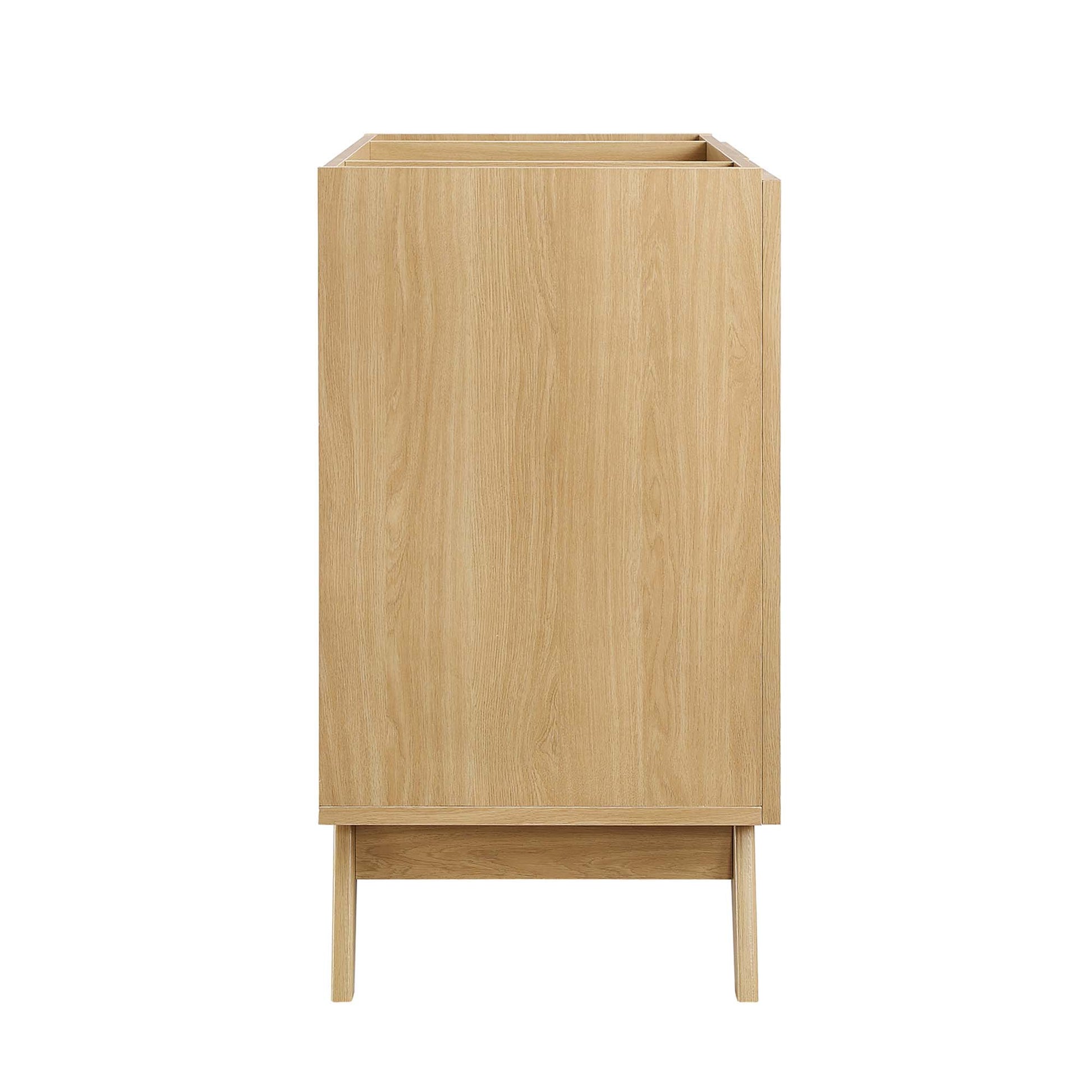 Brown oak bathroom vanity cabinet on slender legs with open top compartment and lower shelf, mid-century modern style.