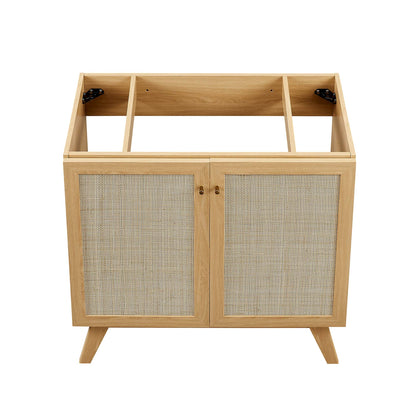 Natural oak cabinet with woven cane panel doors, two-door storage, and angled mid-century legs.
