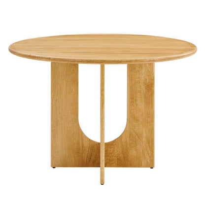Round oak wood dining table with natural finish and a two-panel pedestal base featuring a curved U-shaped opening.