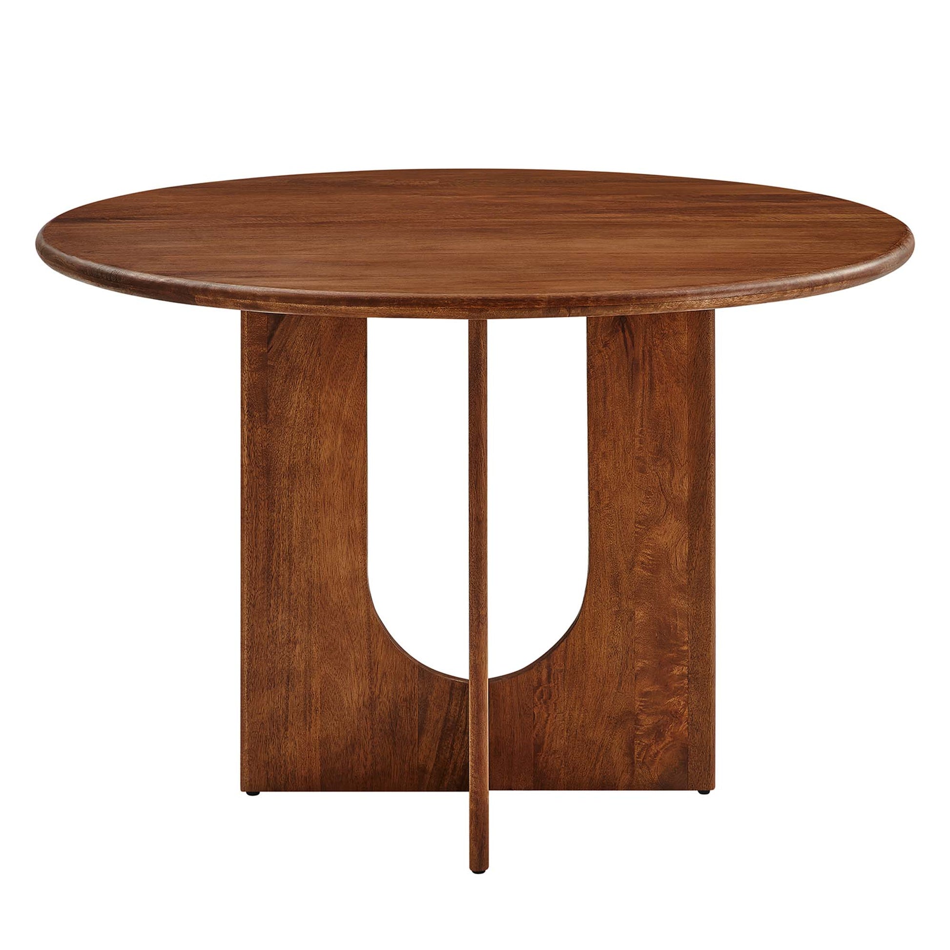 Round walnut-finish wooden table with a sculptural pedestal base and curved cutout.