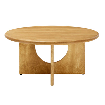Round oak coffee table with solid wood top and base, circular cut-out in the panel supports, warm honey finish.