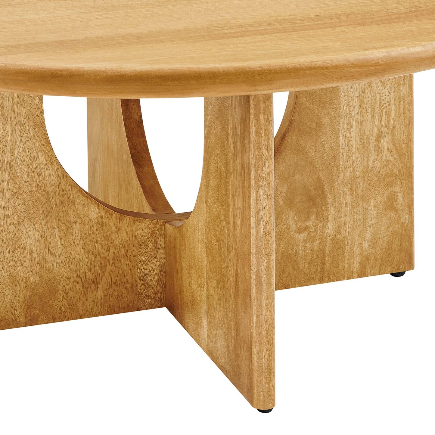 Light oak round coffee table with curved cut-out side supports & solid rectangular legs.