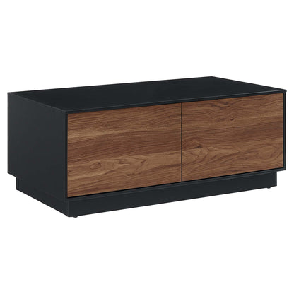 Black coffee table with walnut veneer, rectangular modern design.