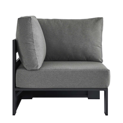 Outdoor modular corner chair with gray cushions and a powder-coated aluminum frame for the patio.