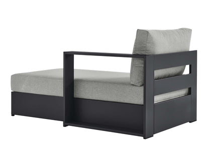 Dark charcoal metal frame lounge chair with light gray cushions; modern boxy design for patio & indoor use.