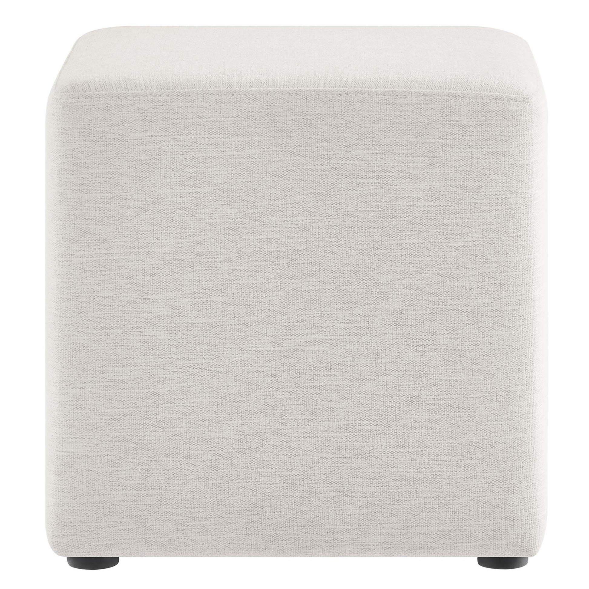 White fabric upholstered cube ottoman with small black feet, soft corners, versatile footrest or stool.
