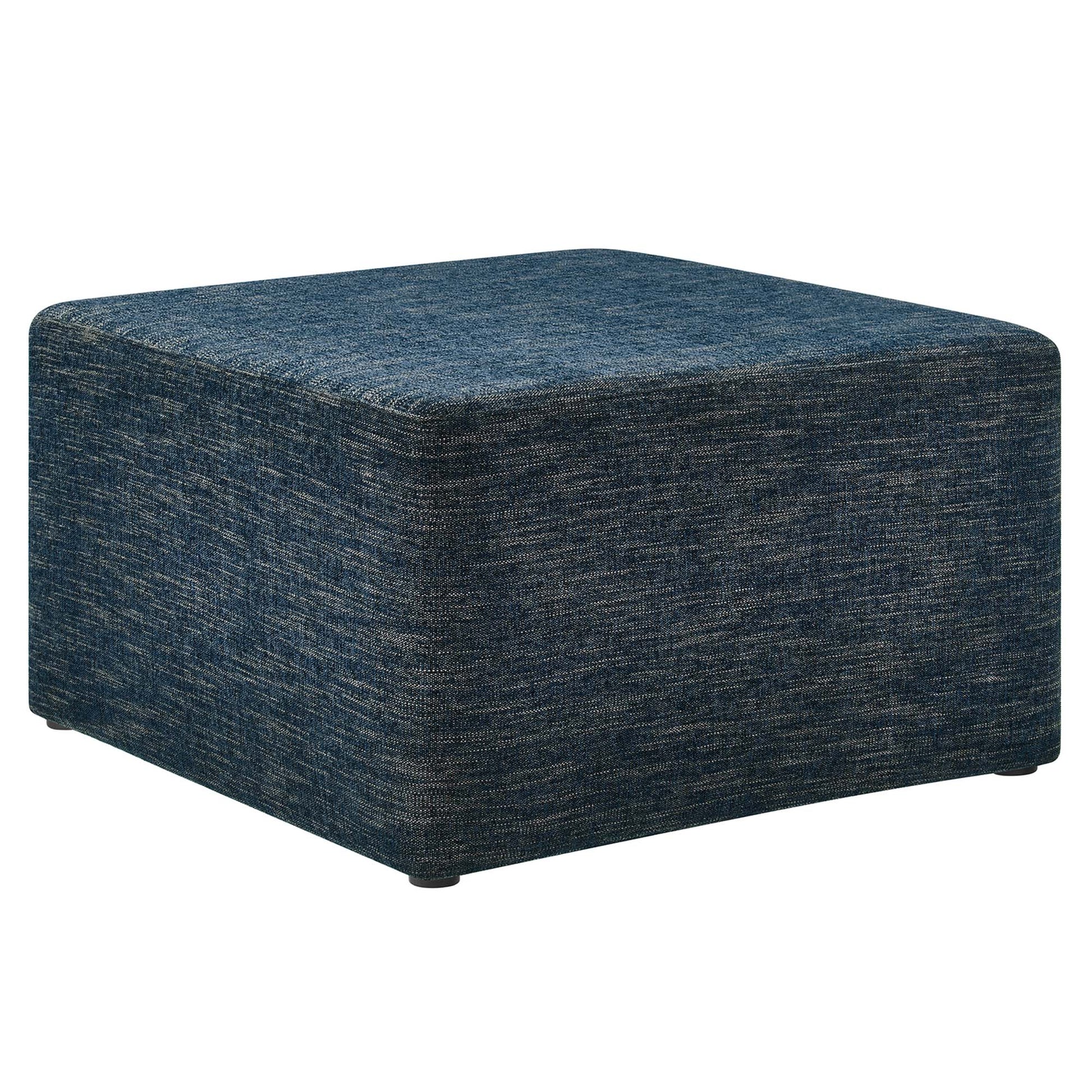 Blue textured fabric cube ottoman footstool with low feet for extra seating.