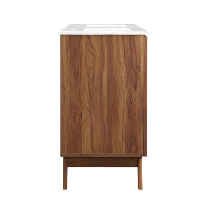 Walnut wood veneer bathroom vanity with white countertop, mid-century modern storage on tapered legs.