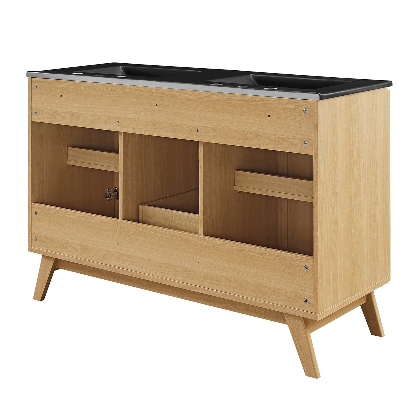 Oak finish wood vanity with black top, dual sink openings and two open cubbies; mid-century modern bathroom storage.
