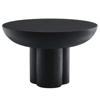Black round concrete coffee table with a matte metal triple-column pedestal.