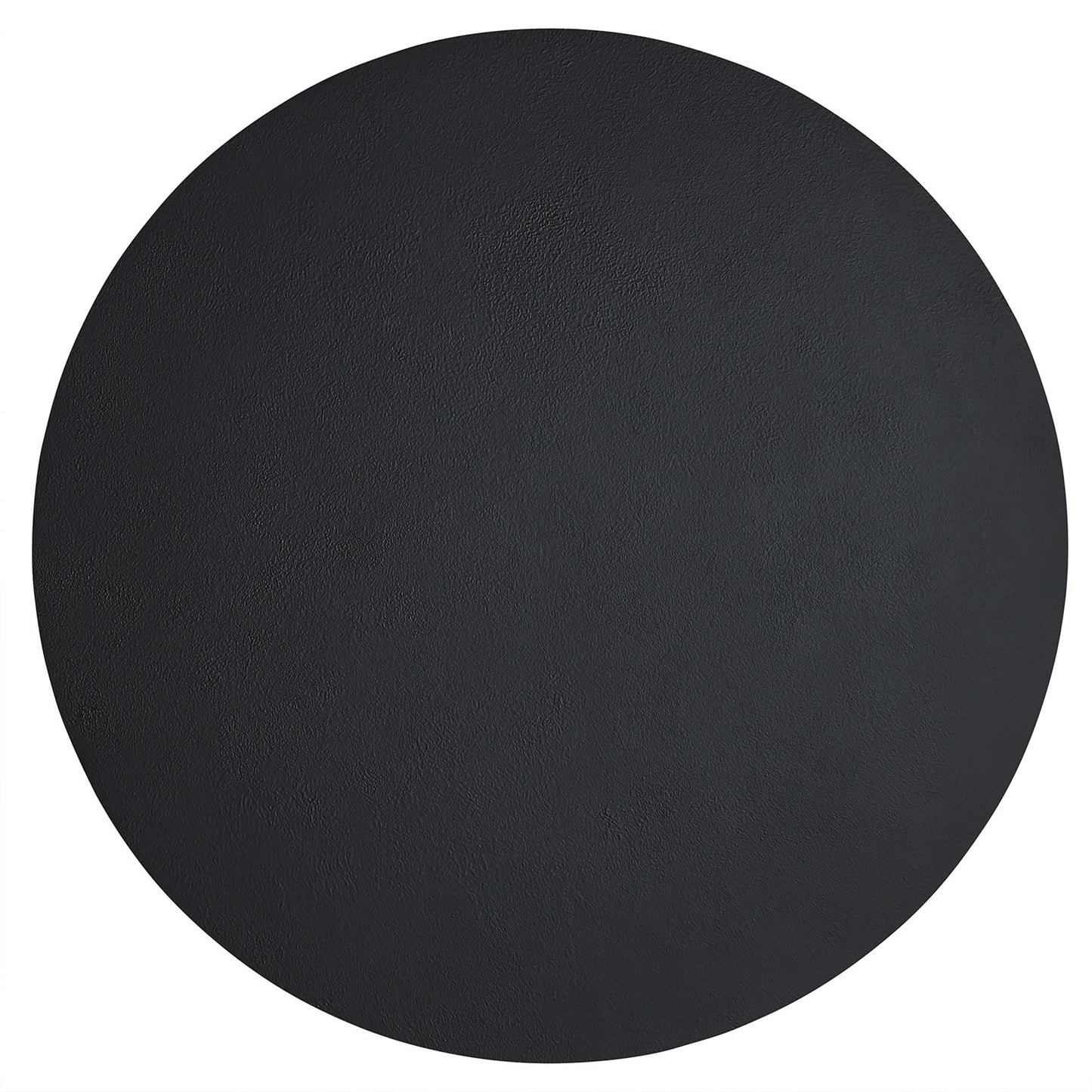 Round black concrete coffee table with matte finish.