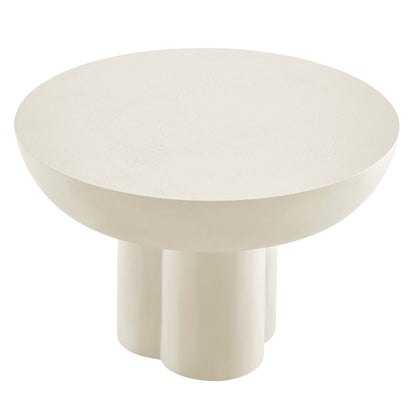 White round coffee table with a wide top and three cylindrical pedestal legs; modern minimalist design.