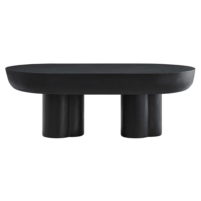 Black oval coffee table with two chunky cylindrical legs, modern minimalist design.