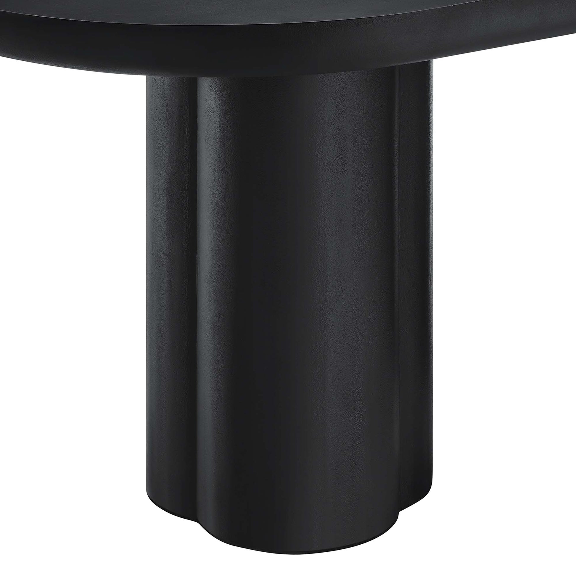 Black oval concrete dining table, 72 inches long.
