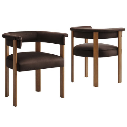 Two dark brown upholstered wood-frame chairs with curved back/arms and light oak legs.