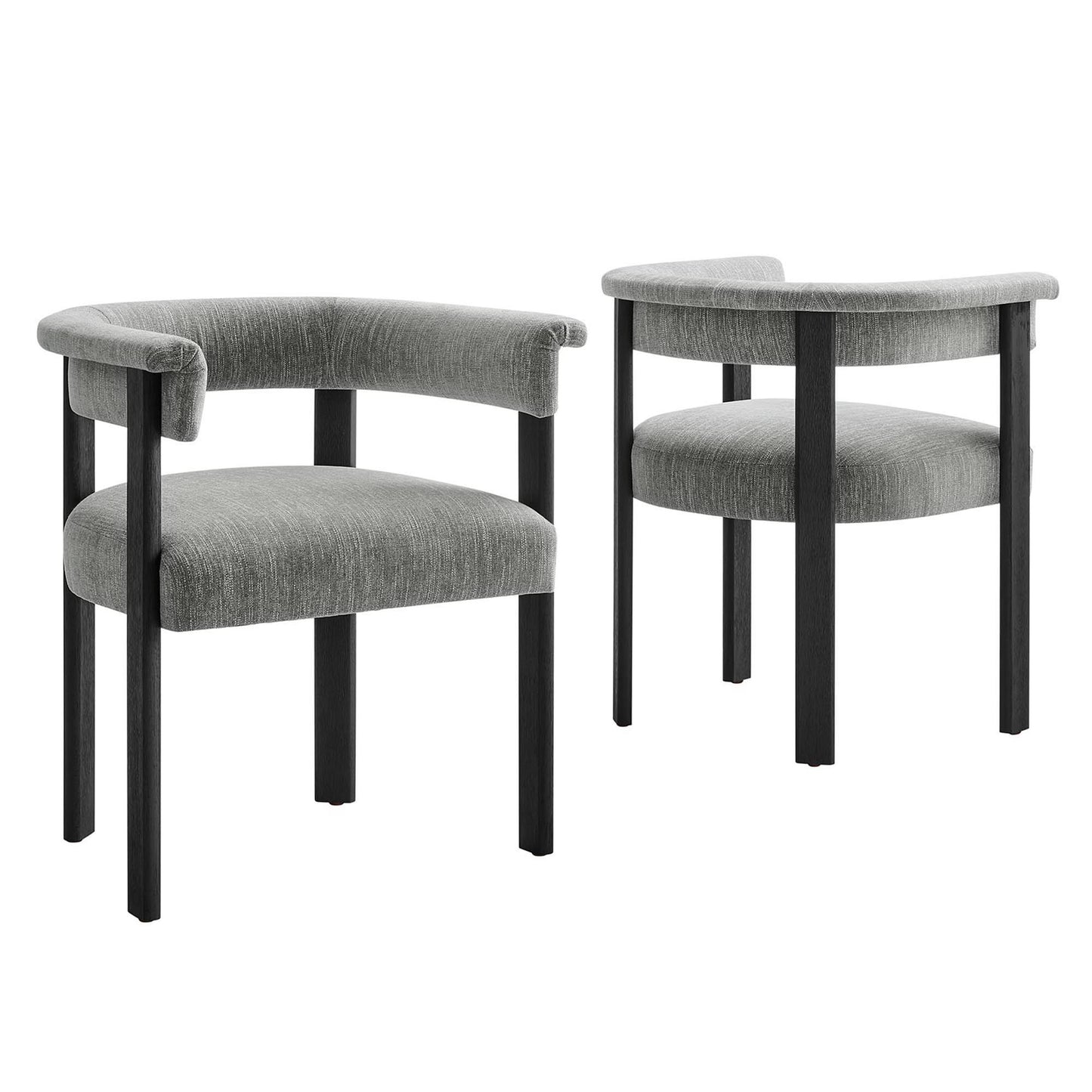 Pair of grey fabric-upholstered barrel dining chairs on black wooden legs.