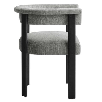 Gray textured fabric armchair with black wooden legs and curved arms, mid-century modern style.