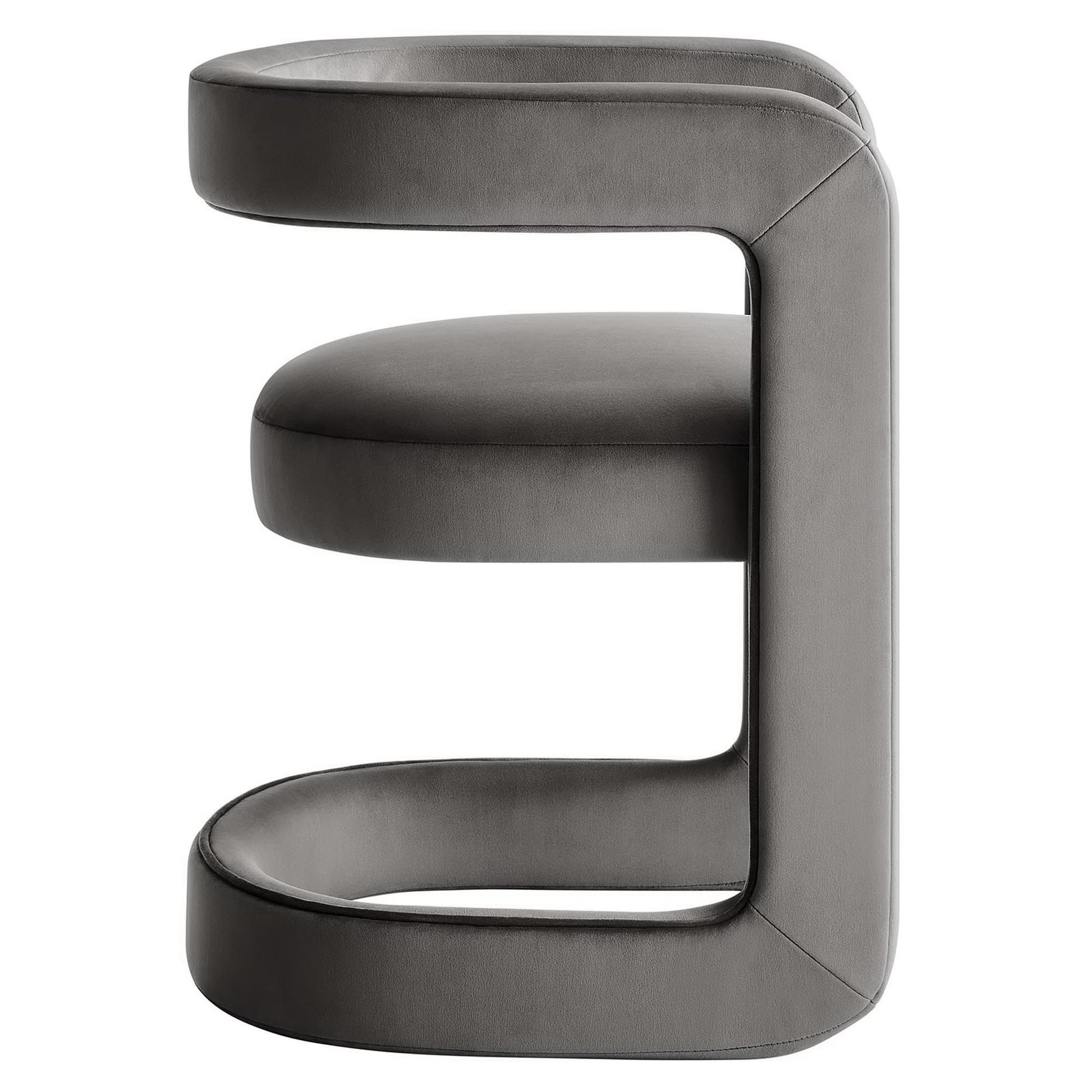 Grey velvet sculptural barrel accent chair with a continuous C-shaped frame and rounded cushions, modern contemporary seating.