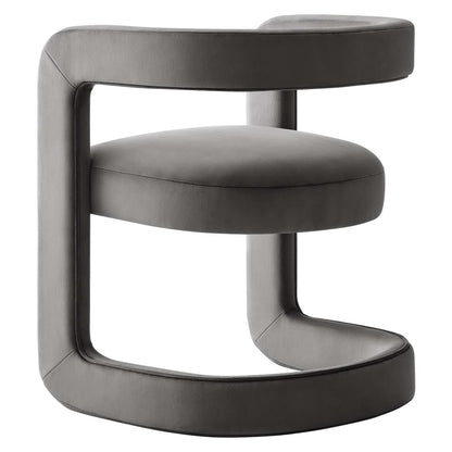 Slate gray velvet upholstered barrel accent chair with curved back and circular base.