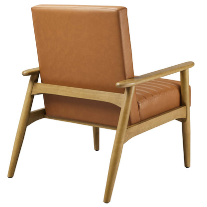 Mid-century modern accent chair with light wood frame and tan vegan leather back and seat cushions.
