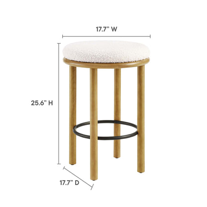 Oak wood stool with ivory round padded seat and black metal footring; 17.7 W x 17.7 D x 25.6 H.