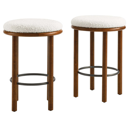 Pair of boucle fabric counter stools (set of 2) with white finish and black circular footrests.