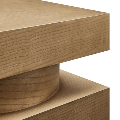 Natural oak wood table pedestal with a rounded cylindrical leg between two rectangular planks.