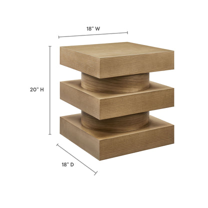Brown end table with three stacked rectangular blocks and central cylinders; measures 18W x 18D x 20H.