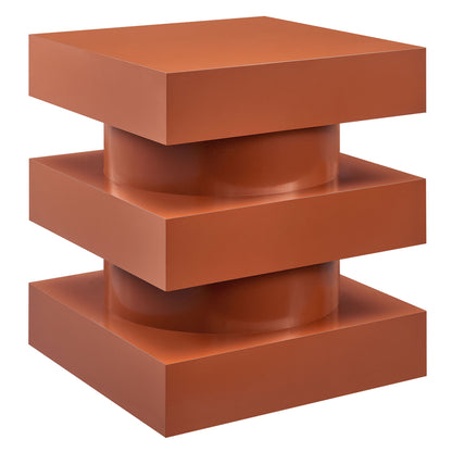 Red end table with a three-tier, square-block totem design and a central cylindrical core; a modern geometric living room table.