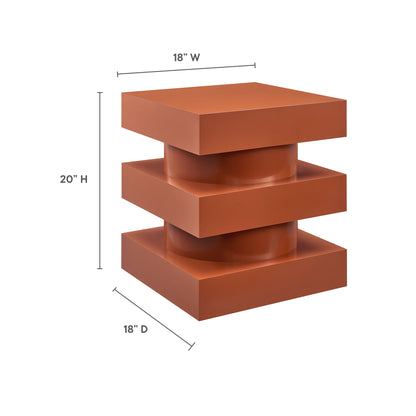 Red ceramic-like end table with three stacked square blocks and cylindrical connectors, 18W x 20H x 18D.