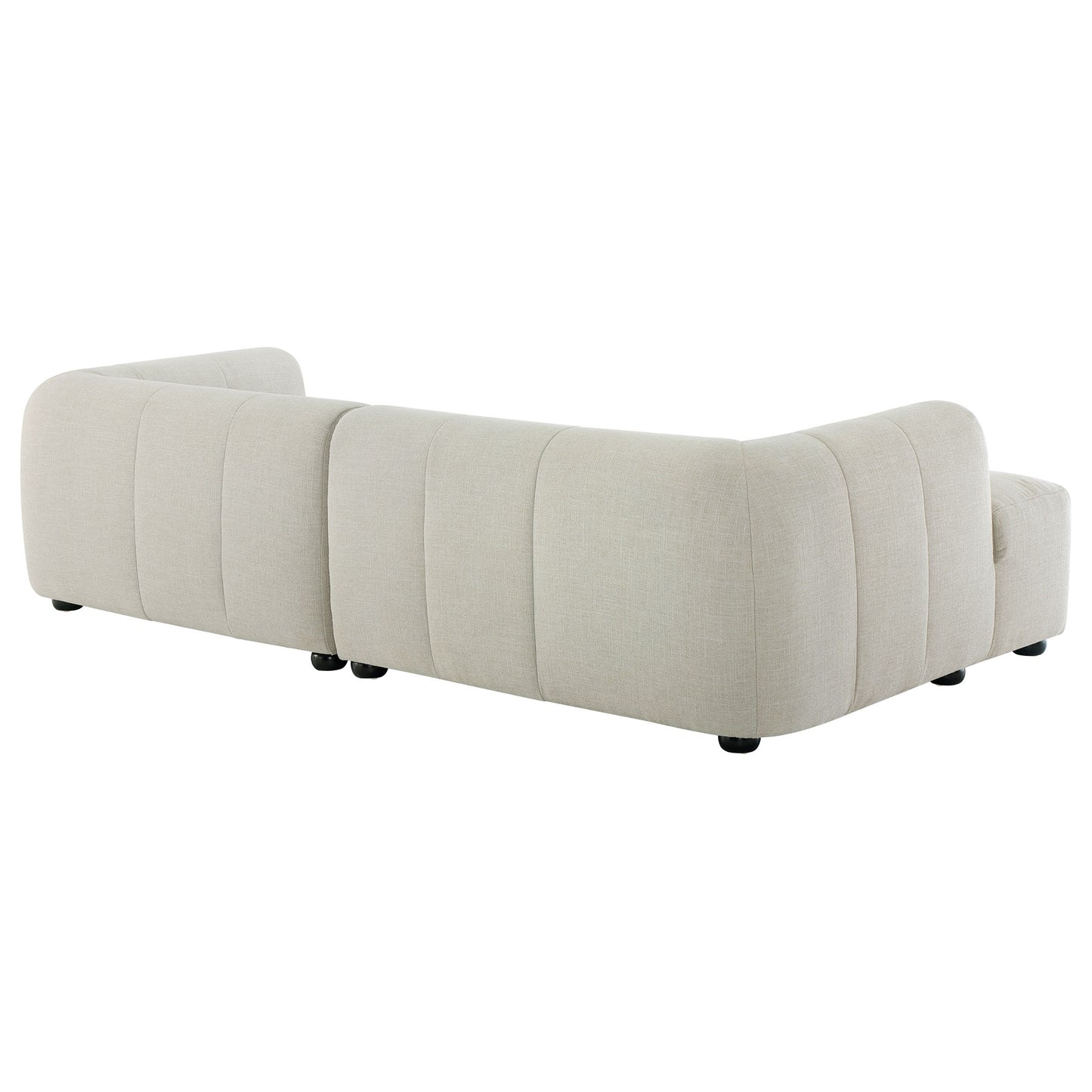 Beige linen fabric left-facing modular sofa with chaise, featuring vertical channel tufting, low rounded arms, and black feet.