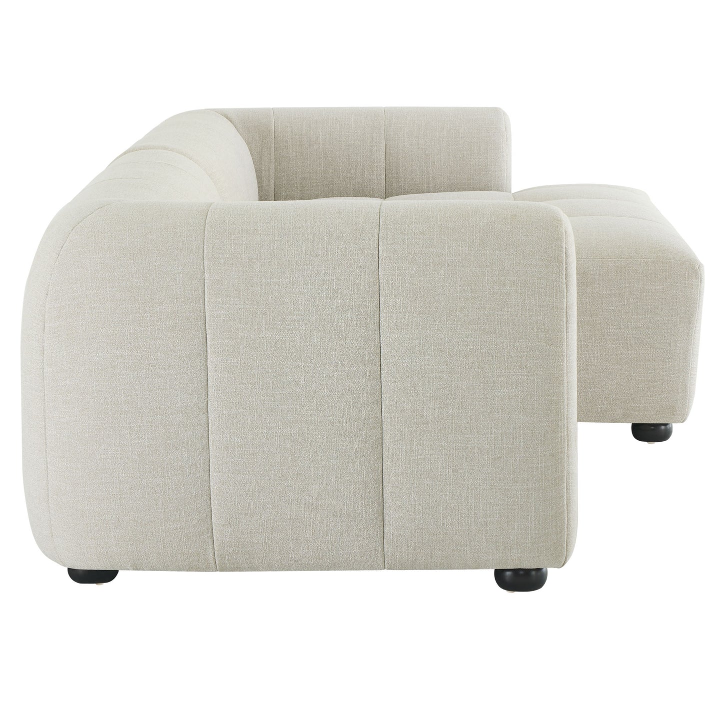 White right-facing upholstered fabric modular sofa with chaise; modular sectional with curved arms, vertical seam panels, and low-profile feet.