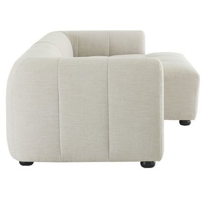White right-facing upholstered fabric modular sofa with chaise; modular sectional with curved arms, vertical seam panels, and low-profile feet.