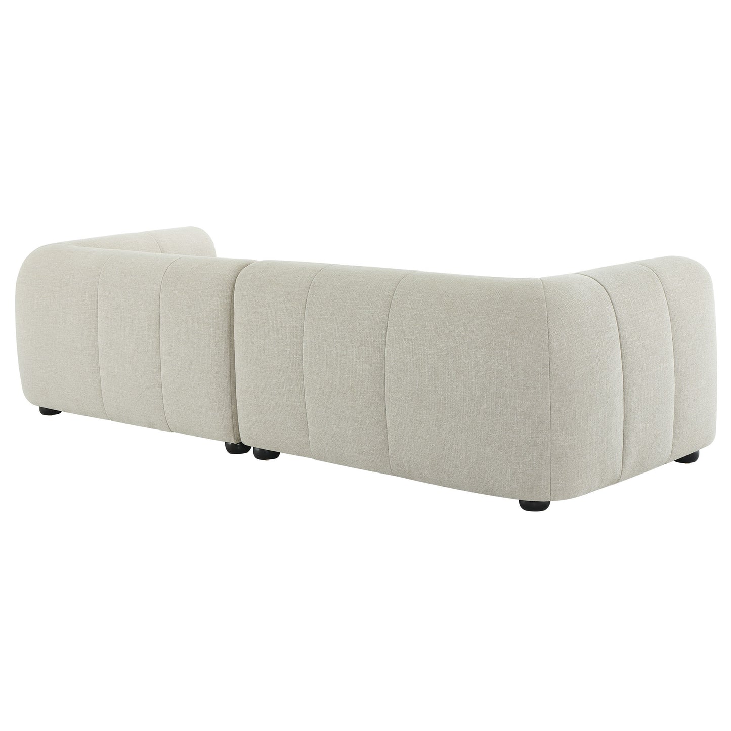 White fabric modular sofa with chaise, right-facing, in three pieces with curved arms and vertical channel seams.