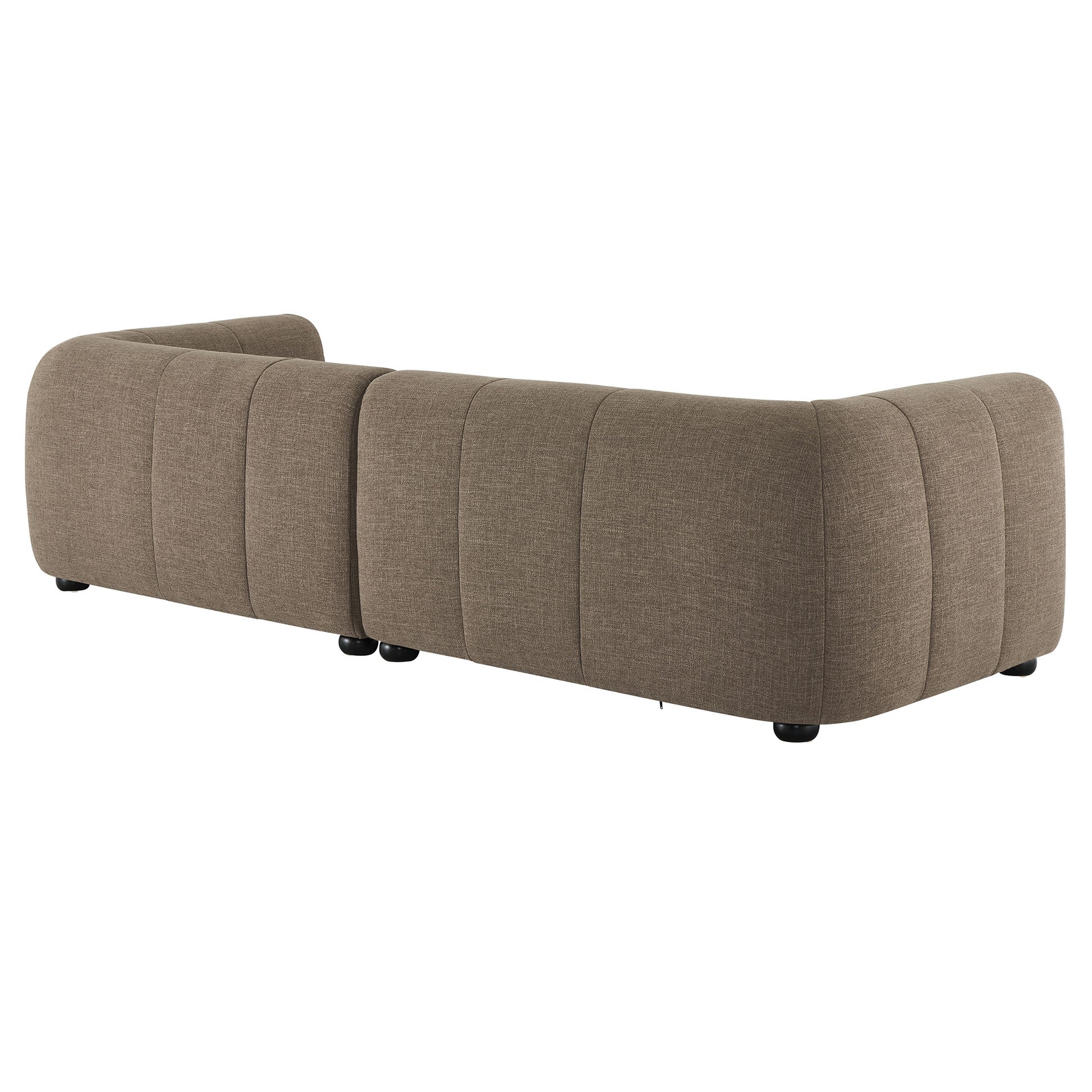 Right-facing mocha fabric modular sofa with chaise, rounded ends, vertical channel tufting, and low-profile legs.