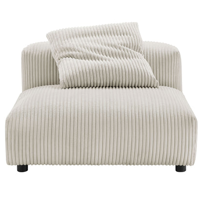 Brown ribbed corduroy armless modular chair with two matching cushions and short legs.